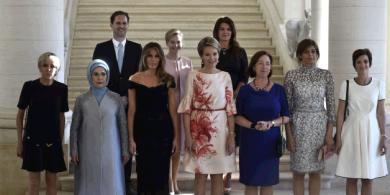 ماهي قصة الرجل الذي ظهر في الصورة الخاصة بزوجات زعماء الناتو ؟